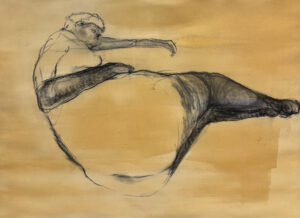 Charcoal and Indian ink figure study of a reclining form with expressive loose linework on a warm ochre wash background, by Canadian figurative artist Joanna Aplin.